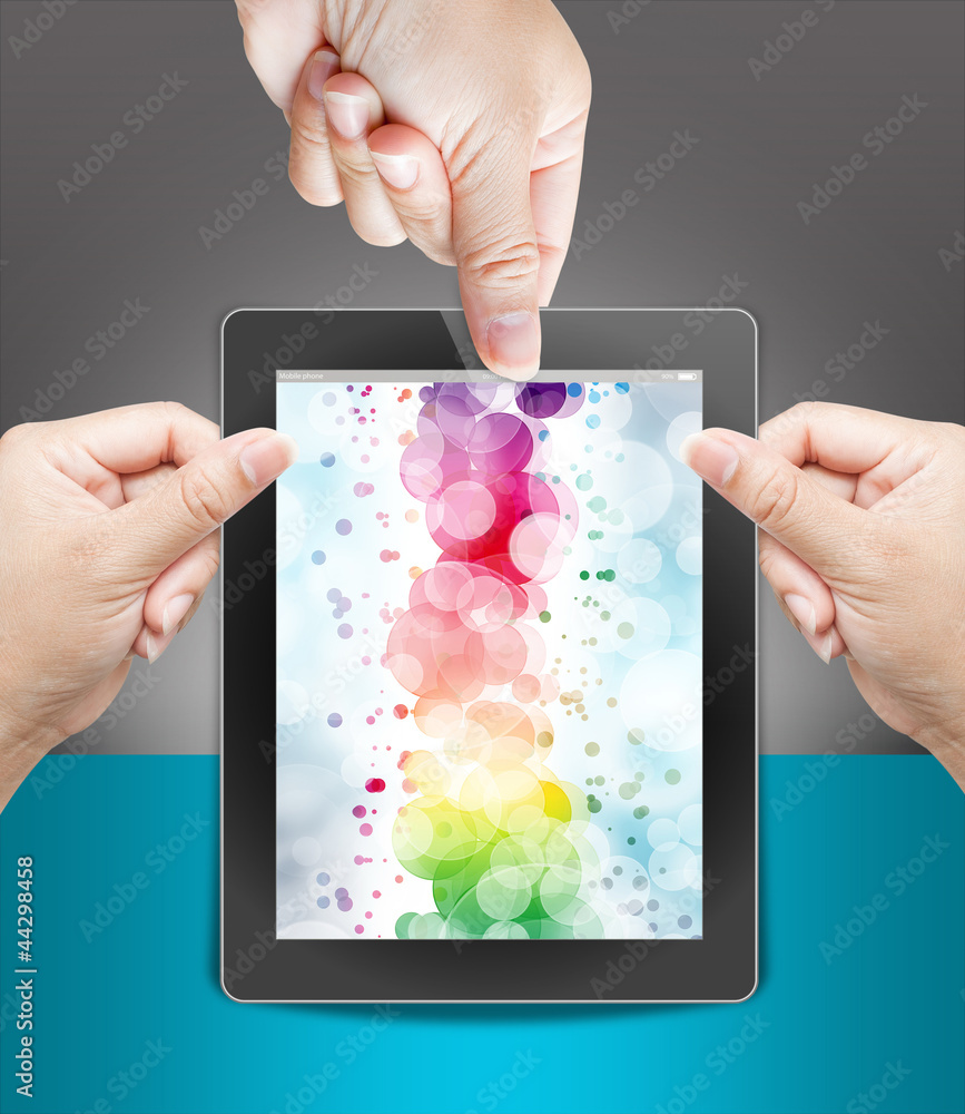 hand of business man holding and touching on touch pad hand of business man holding and touching on touch pad