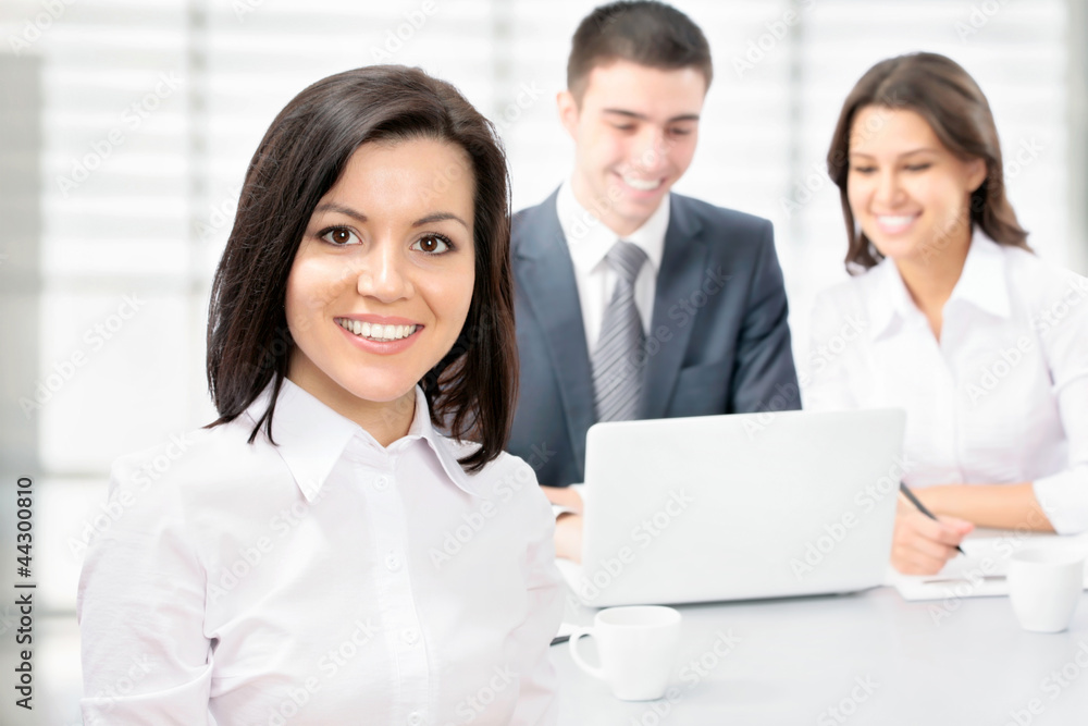Happy business woman with colleagues Happy business woman with colleagues