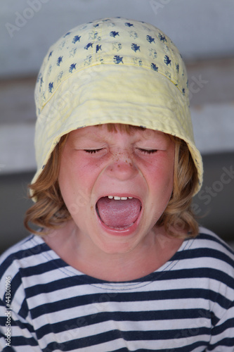 outdoor portrait of young sailor shouting loudly