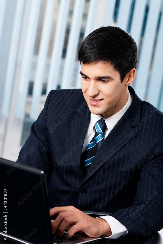 Businessman working with laptop Businessman working with laptop
