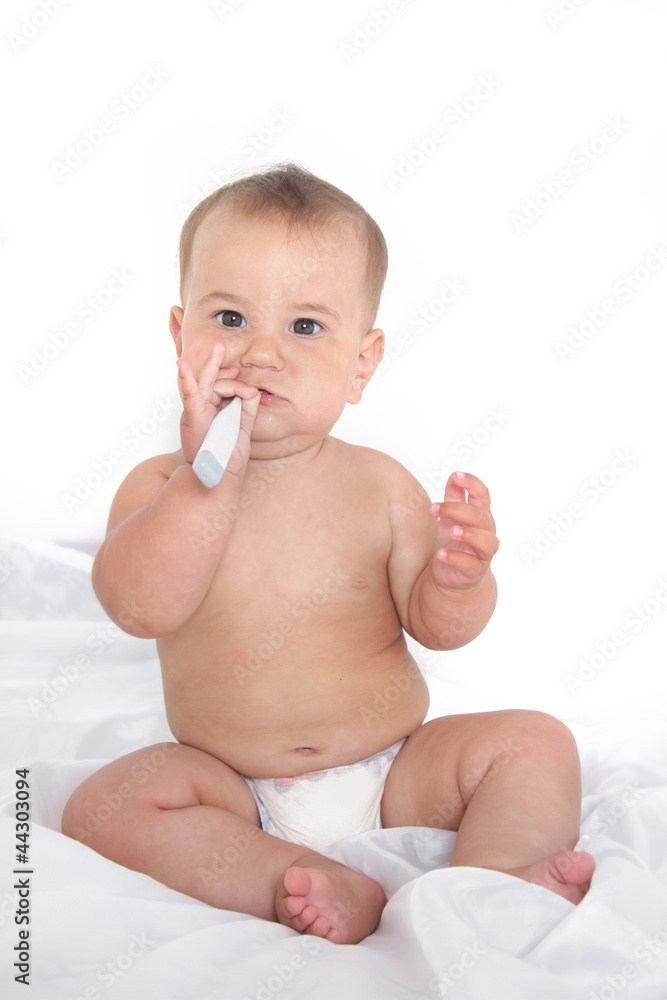 studio shot of cute baby with thermometer isolated over white ba studio shot of cute baby with thermometer isolated over white ba