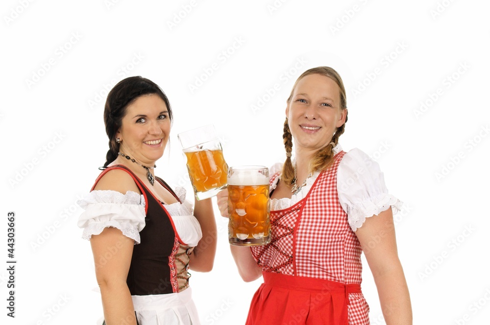 Two young pretty women in dirndl with beer mug Two young pretty women in dirndl with beer mug