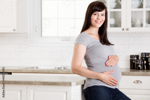 Pregnant Woman with Hands on Belly