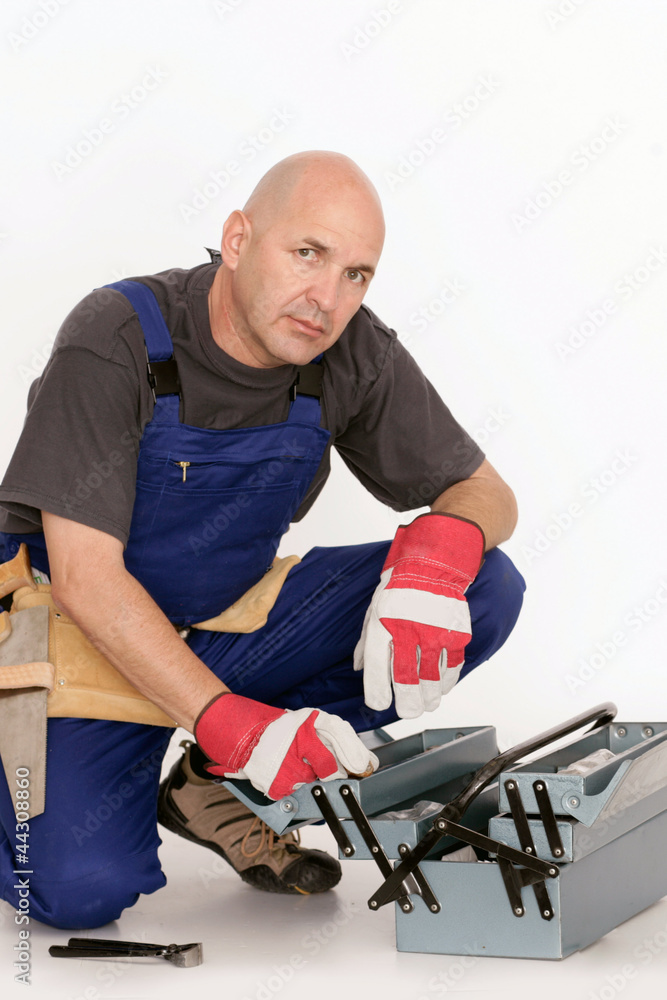 Heimwerker mit Werkzeugkasten Heimwerker mit Werkzeugkasten