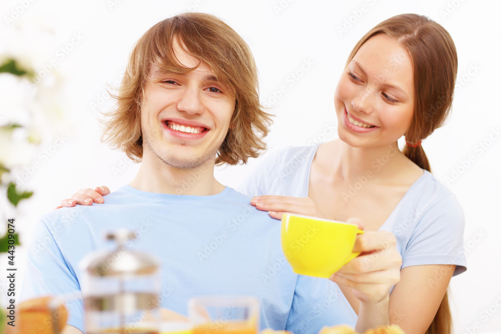 Couple at home drinking tea Couple at home drinking tea