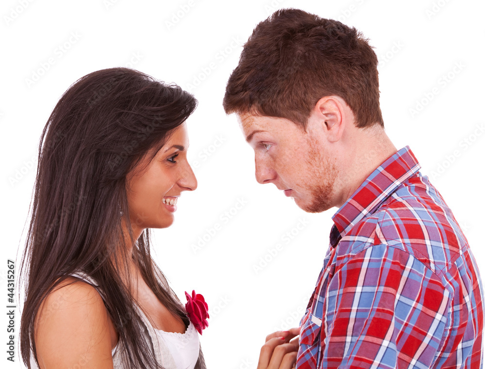 Young man looking at his smiling girlfriend Young man looking at his smiling girlfriend