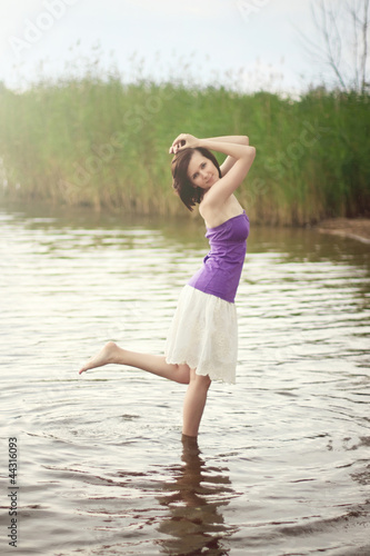 Young woman in the lake