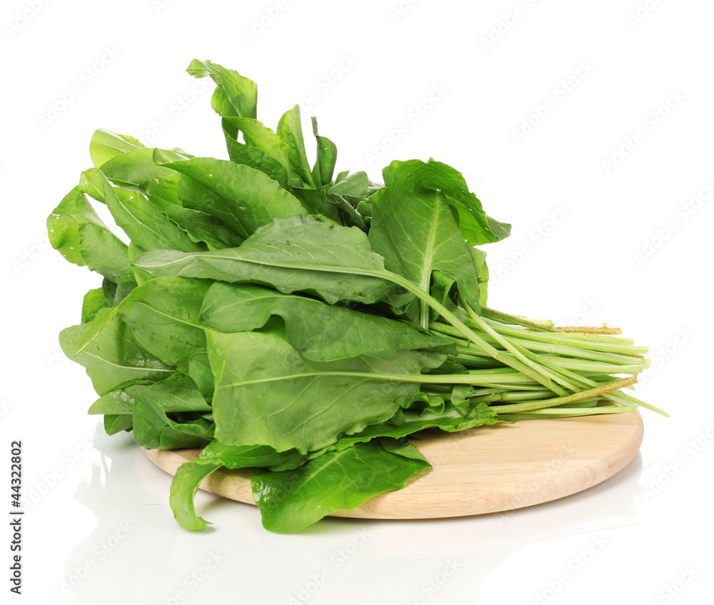 Fresh sorrel on board isolated on white Fresh sorrel on board isolated on white