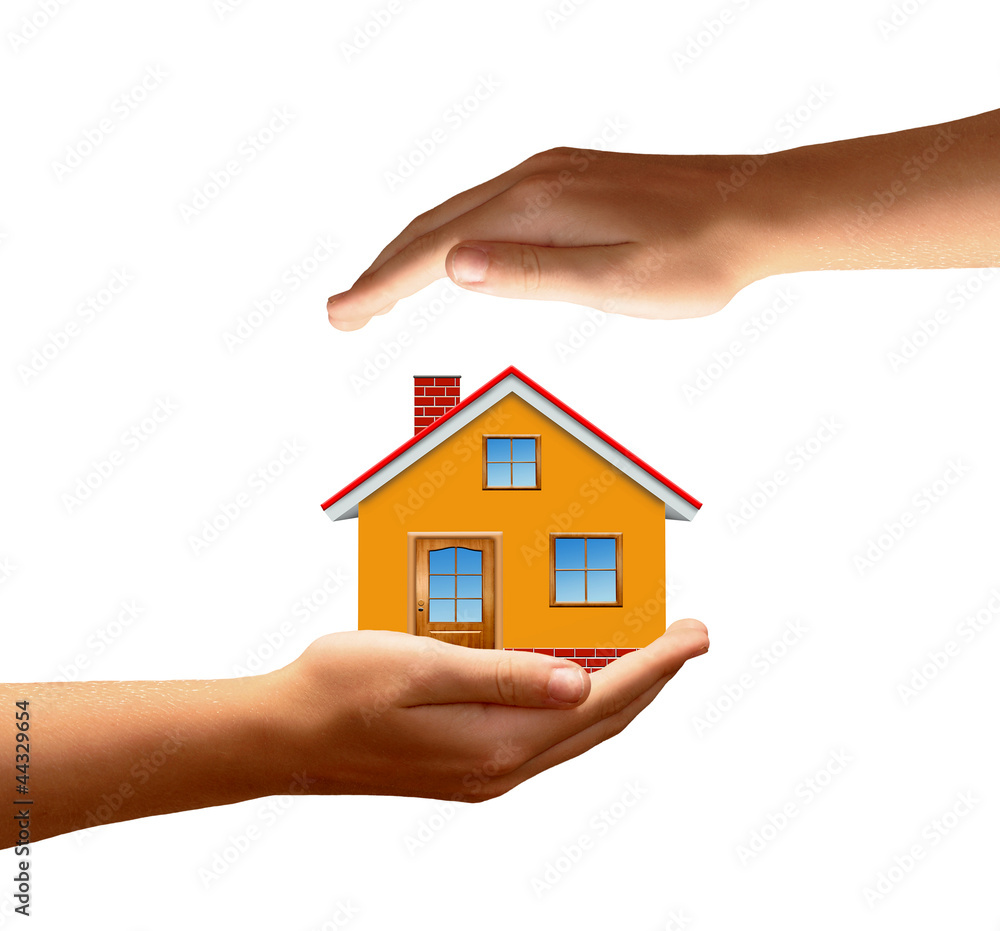 The house in hands isolated on white background The house in hands isolated on white background