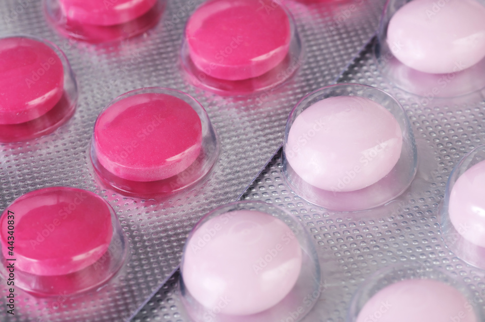 Red and pink tablets Red and pink tablets