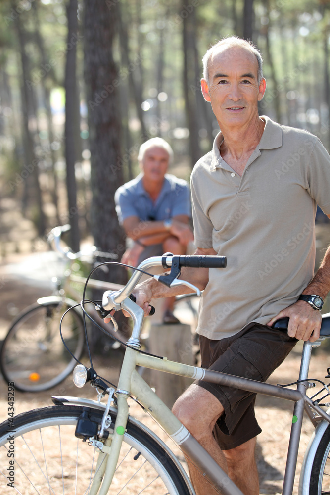 Two older men out for a bike ride