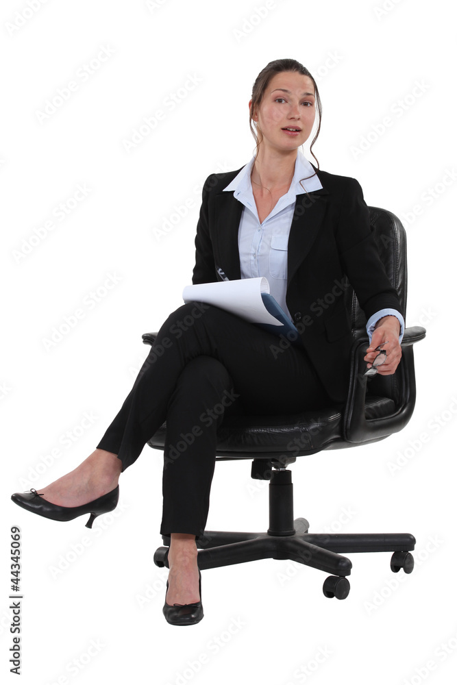 Woman writing a business report