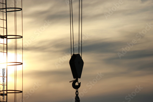 Crane hook and sunset