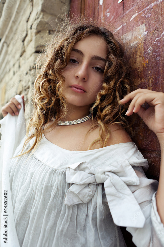 Fototapeta premium Portrait of a young beautiful girl