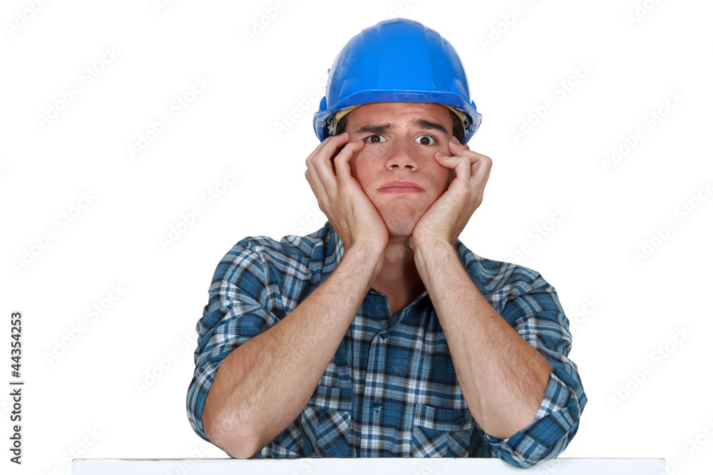 Head and shoulders of a young construction worker Head and shoulders of a young construction worker