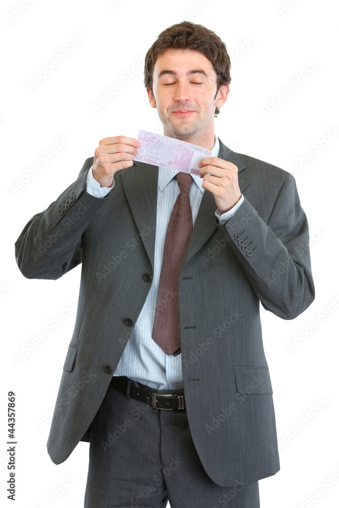 Happy businessman smiling 500 euros note Happy businessman smiling 500 euros note