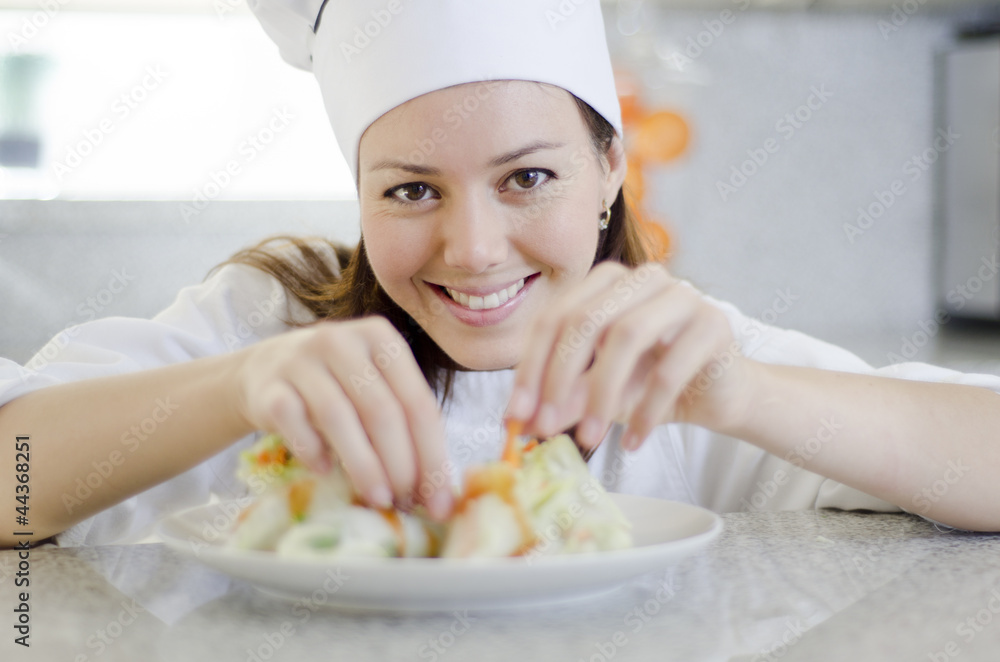 Adding finishing touches to a dish Adding finishing touches to a dish