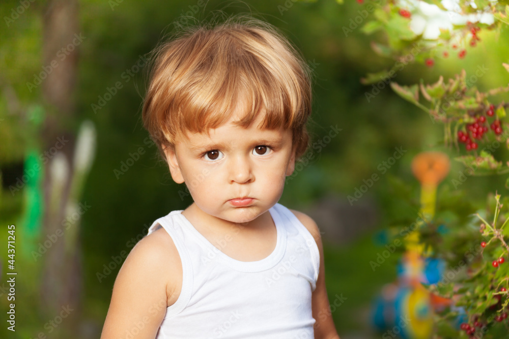 moody kid in the garden moody kid in the garden