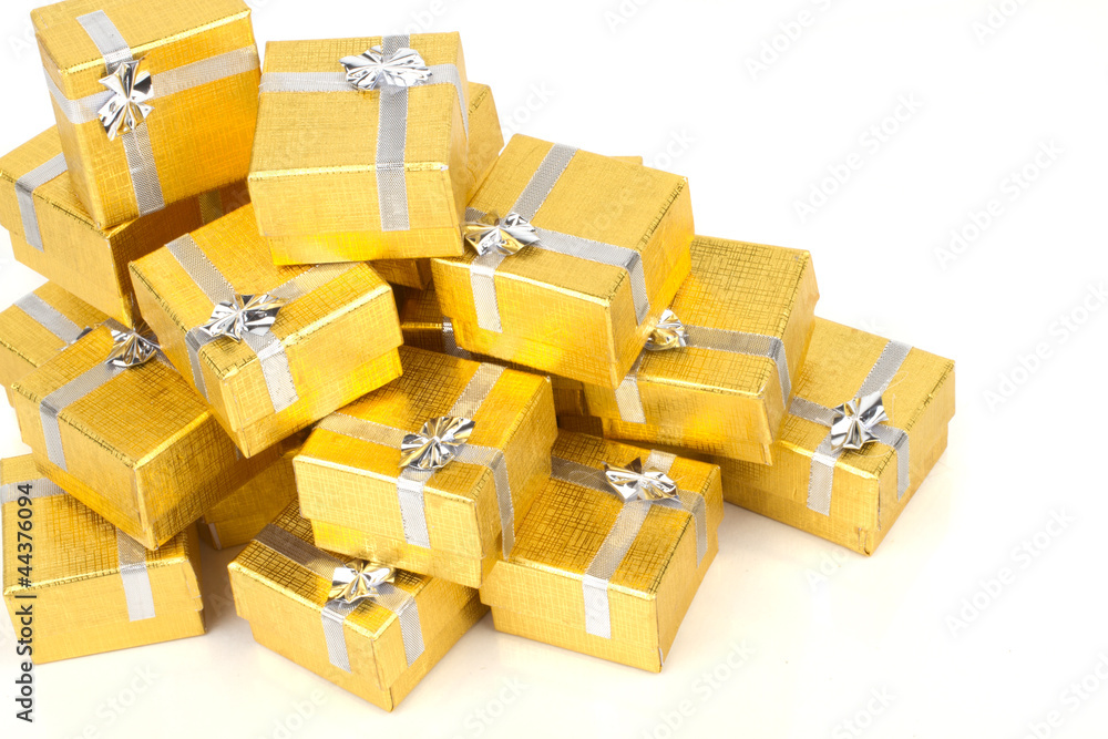 Top view of towel of gold gift boxes Top view of towel of gold gift boxes