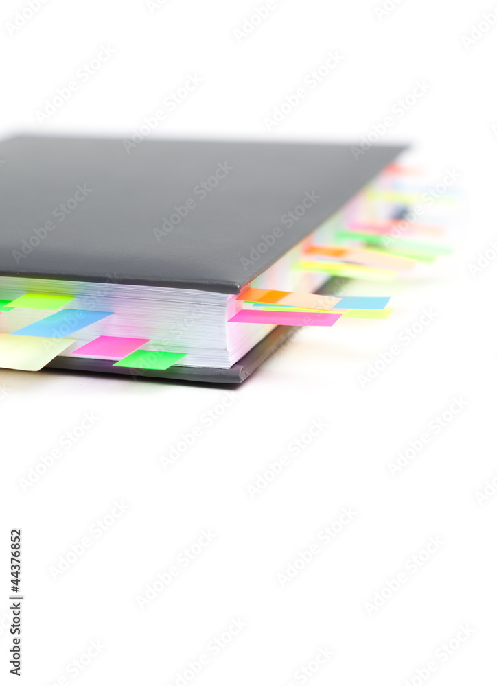 Naklejka premium Diary with a tabs, isolated on white background