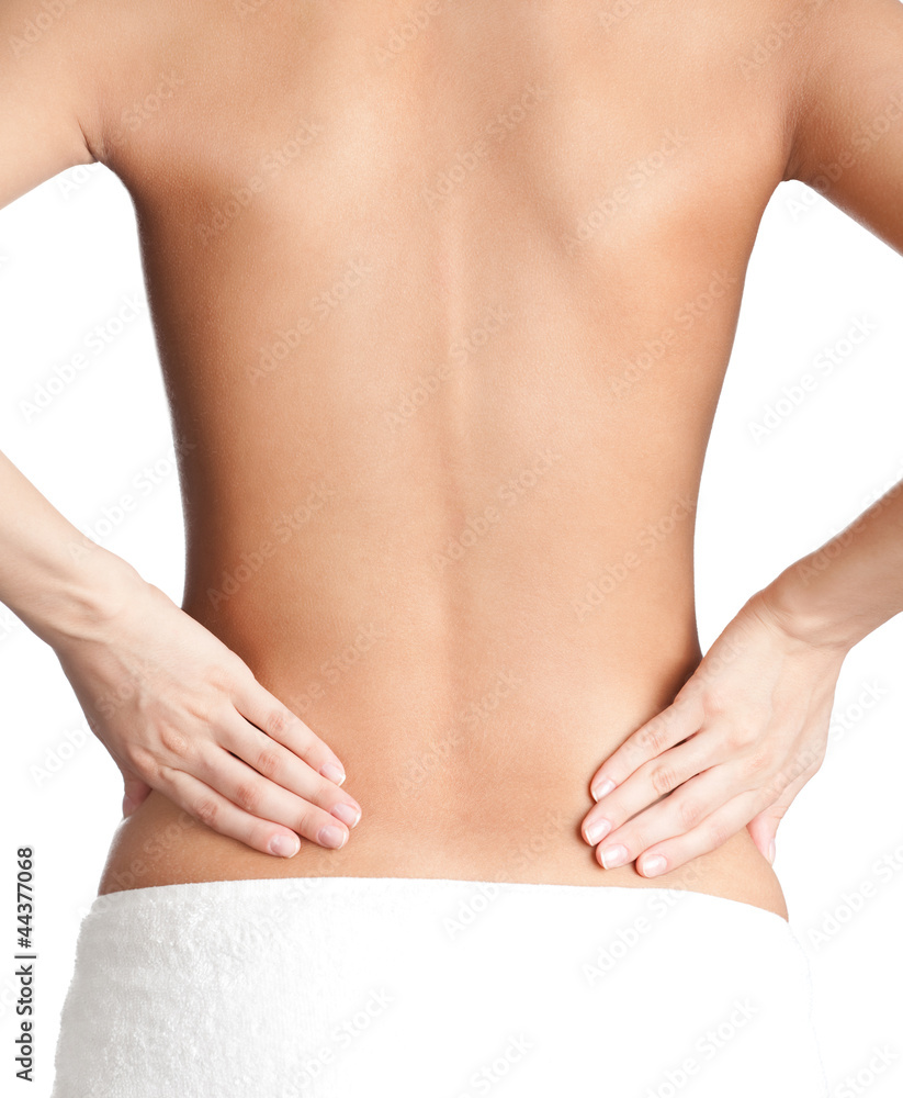 Naklejka premium Loin of an athletic woman, isolated, white background