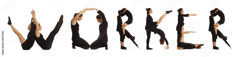 Black dressed people forming WORKER word over white Black dressed people forming WORKER word over white