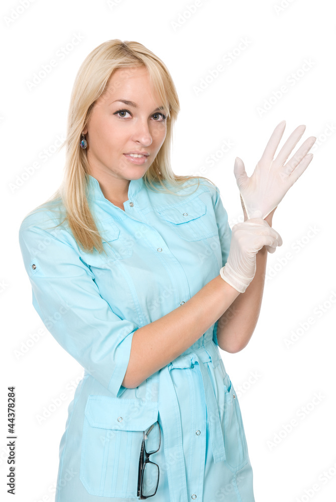 The doctor puts on gloves. The doctor puts on gloves.