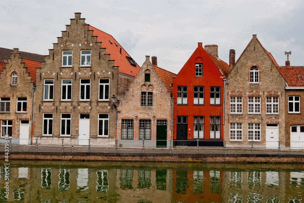 Fototapeta premium Bruges, Belgium, houses along the channel
