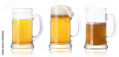 Frosty fresh beer set with foam isolated