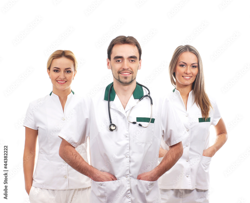 A team of young Caucasian medical workers in white clothes A team of young Caucasian medical workers in white clothes