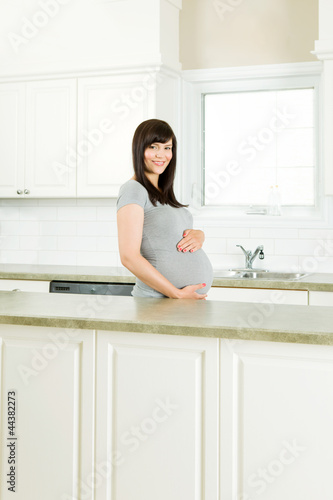 Pregnant Woman in Kitchen