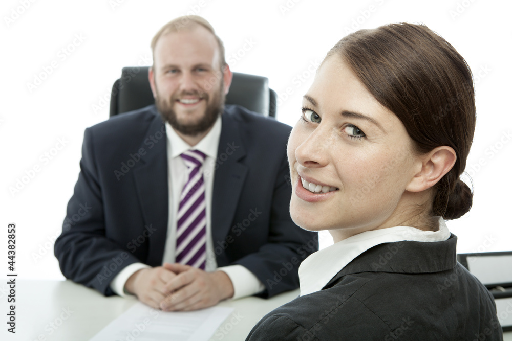 beard business man brunette woman at desk smiling beard business man brunette woman at desk smiling