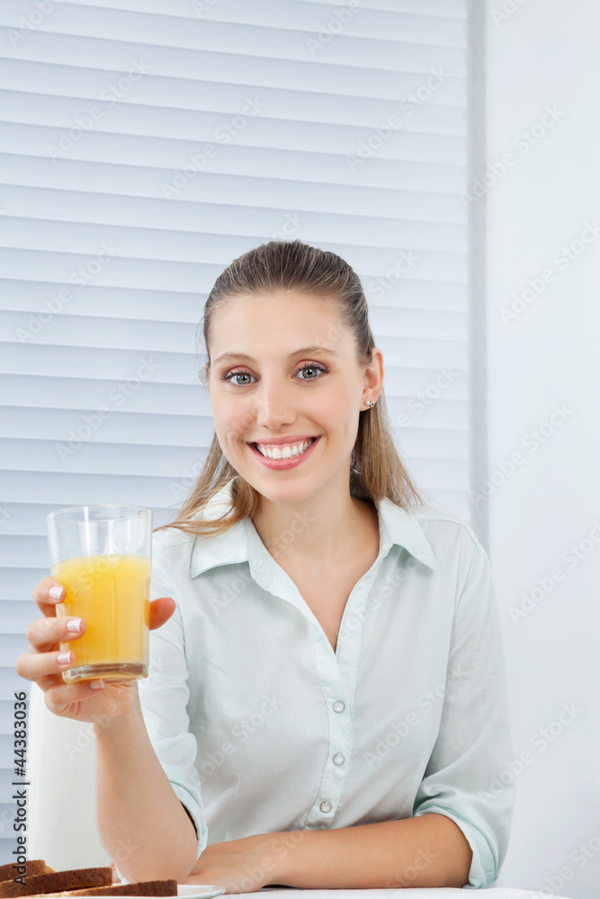 Happy Businesswoman Holding Orange Juice Happy Businesswoman Holding Orange Juice