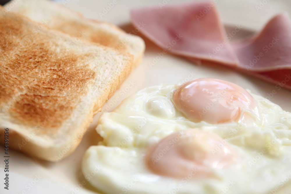 Breakfast with ham , fried egg and bread Breakfast with ham , fried egg and bread