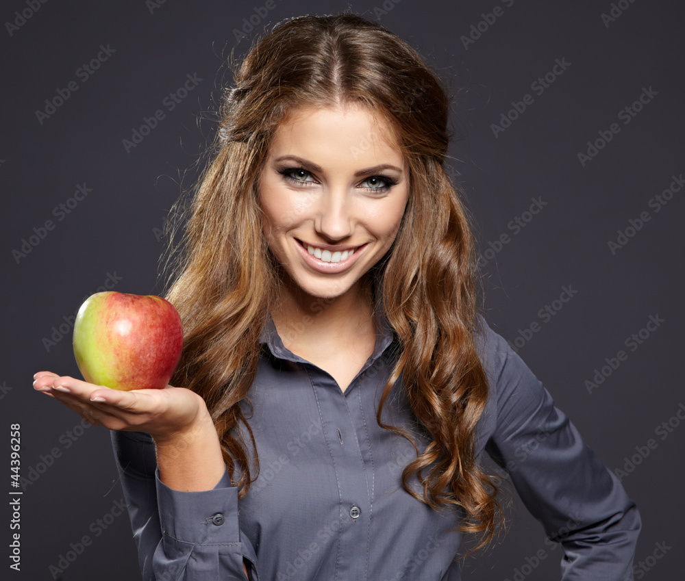 Closeup portrait of cute young business woman smiling at studio. Closeup portrait of cute young business woman smiling at studio.