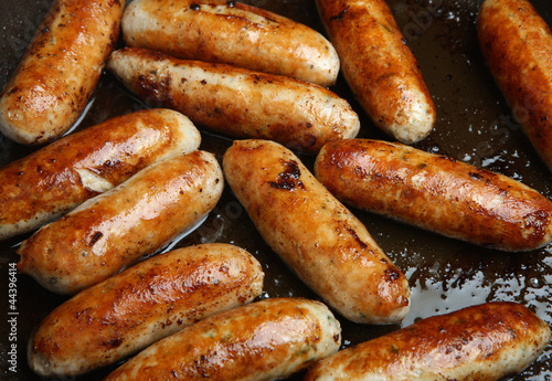 Sausages Cooking in Frying Pan