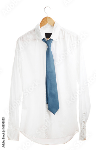 shirt with tie on wooden hanger isolated on white