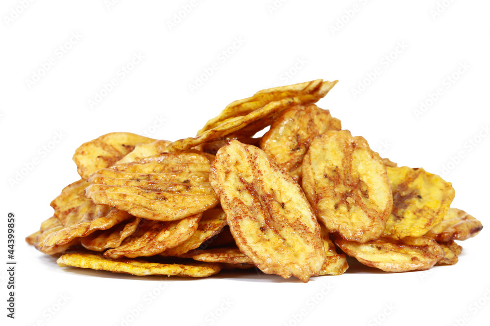 Fried thinly sliced banana chips, a tropical snack Fried thinly sliced banana chips, a tropical snack