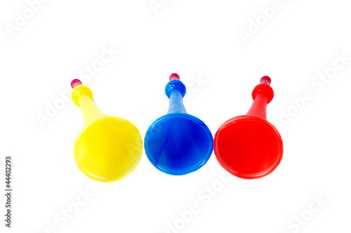 three colorful plastic terumpet photo