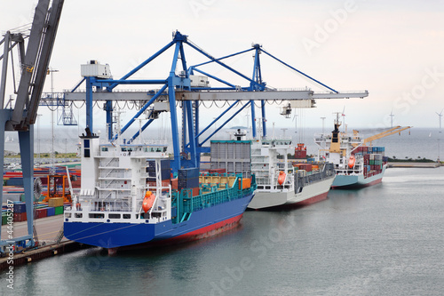 Three cargo ships in Copenhagen seaport, Denmark