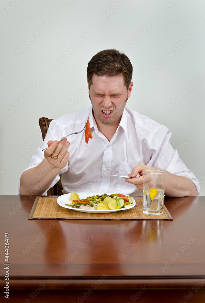 Man is disappointed with his dish Man is disappointed with his dish