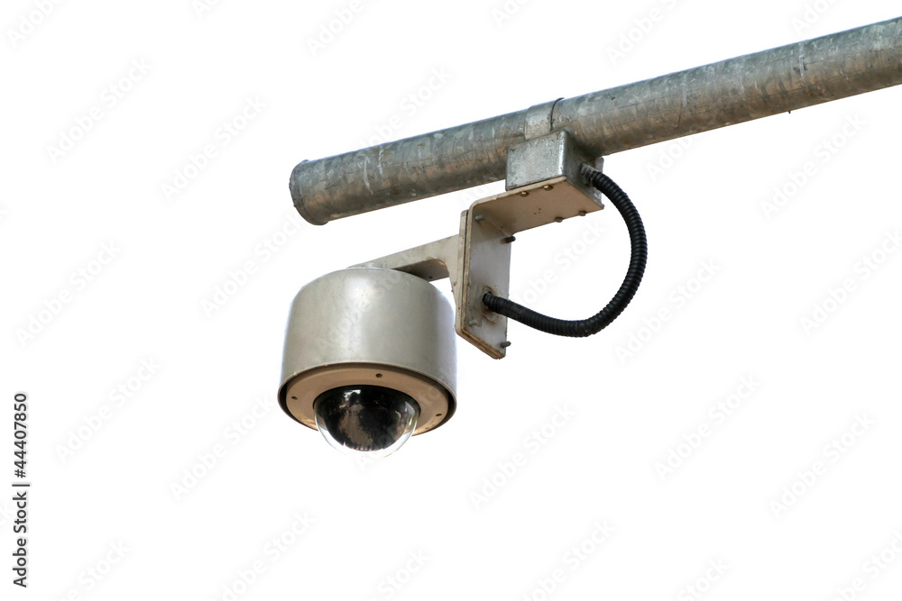 Dome type surveillance camera isolated on white background.