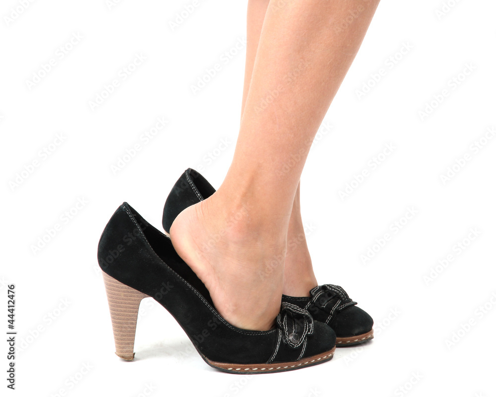 little legs in mommy's shoes, isolated on white little legs in mommy's shoes, isolated on white
