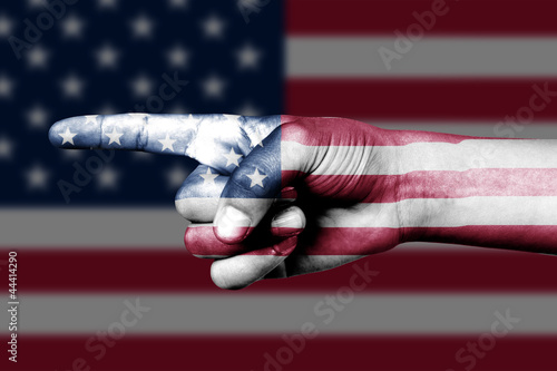 hand point with finger in United States of America national flag
