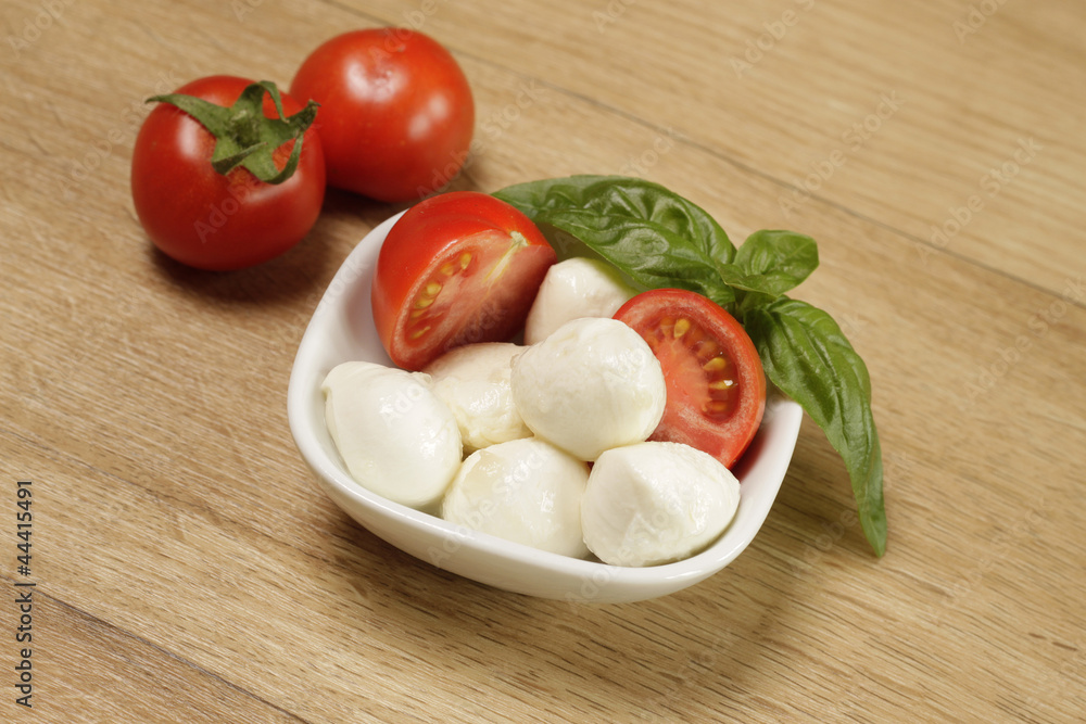 Mozzarella with basil and tomatoes Mozzarella with basil and tomatoes