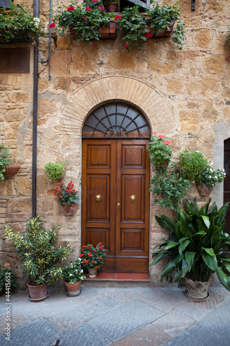 wooden residential doorway in Tuscany. Italy