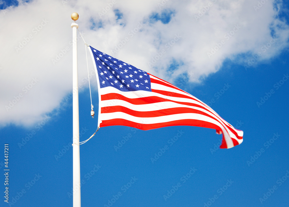 american flag flying in the wind