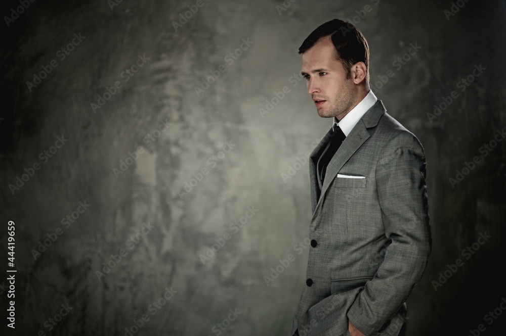 Man in grey suit Man in grey suit