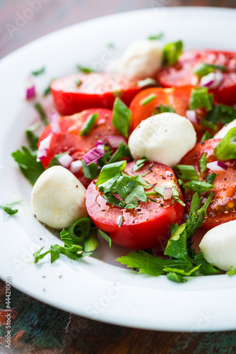 Cherry tomatoes with mozzarella and fresh herbs