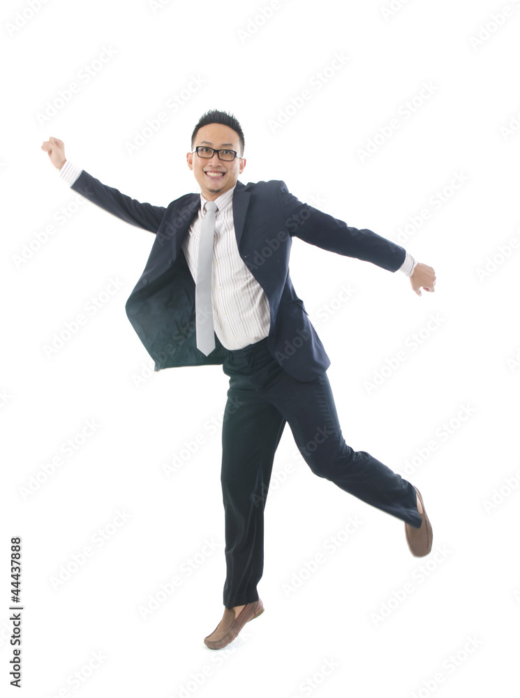 asian business jumping in joy